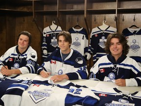 Sudbury Nickel Capitals U18 AAA players Bryson Smith, Tyler Thompson and Aleksander Duguay pose for a photo during a signing ceremony at Gerry McCrory Countryside Sports Complex in Sudbury, Ontario on Thursday, July 28, 2022.