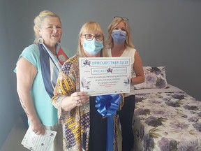 The Chatham-Kent Women's Centre opened a new bed designated for those fleeing human trafficking on July 28. From left are Kelly Tallon Franklin, founder of Courage for Freedom; Karen Hunter, executive director of the centre; and Tara Greenway, co-chair of the Chatham-Kent Anti-Human Trafficking Coalition and a sexual assault/domestic violence team lead at the Chatham-Kent Health Alliance. Trevor Terfloth/Postmedia