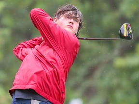 Cole Labadie of Tilbury Golf Club tees off in the rain on the first hole at Willow Ridge Golf & Country Club in Blenheim, Ont., on Sunday, July 17, 2022, during a Jamieson Junior Golf Tour event. Mark Malone/Chatham Daily News/Postmedia Network