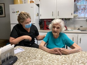 PSW Micheline Matte (left) has a passion for helping seniors like Mary Wiley (right). Matte works in Carefor’s supporting housing facility in Cornwall. SUPPLIED