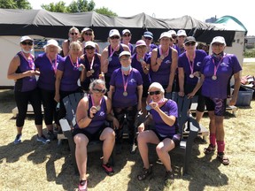 Brantford's Amelia Davis, left, and Bobbi Jo Beitz, right, were part of the bronze-winning Knot A Breast dragon boat team, made up entirely of breast cancer survivors, at the Hamilton Dragon Boat Festival last weekend.