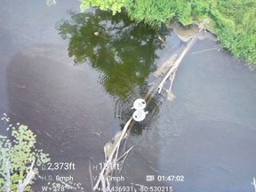 The Grey Highlands Fire Department used its Enterprise Drone to locate two people who needed to be rescued from the Beaver River Saturday night when their planned tubing trip didn't go as expected. Pictured is a still image from video the drone shot while flying over the location of the rescue about halfway between Access Point 1 and Access Point 2.  Photo submitted.