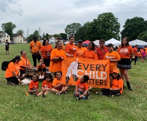 Michelle Martin said much of her family – which now numbers 85 members – turned out for the Every Child Matters walk on Canada as a way of making a statement, reminding those celebrating elsewhere that Canada “tried to take away our identity.”