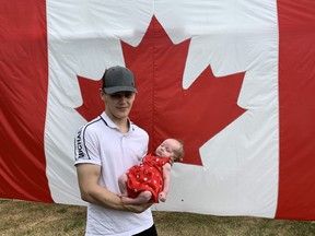 A giant Canadian flag provided a perfect backdrop for photos, including one of tiny seven-week-old Deliliah Cromwell-Andrews celebrating her first Canada Day in the arms of her dad, Zack Andrews.