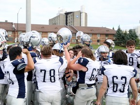 Sudbury Junior Spartans players celebrate winning their Ontario Summer Football League semifinal against the Peterborough Wolverines at James Jerome Sports Complex in Sudbury, Ontario on Saturday, July 30, 2022.