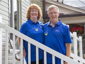 Sandra and David McCandless are volunteers with the Billy Graham Evangelistic Association of Canada, a Christian organization, and have travelled to Toronto six times to greet charter flights of Ukrainian refugees. Photo shot in St. Thomas on Wednesday July 6, 2022. (Derek Ruttan/The London Free Press)