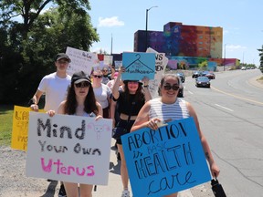 More than 30 protesters, including supporters of all ages, pregnant women, mothers and their children, protested for abortion rights on Sunday. The group marched from Bell Park down Paris Street and over the Bridge of Nations to the Rainbow Centre. Mia Jensen