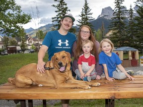Tyler and Cara Clarkson live in Canmore with their sons Jakobje, 2, Beau, 5 and their labernese dog named Dug. Cara is Director of Operations at the Rimrock Resort Hotel in Banff. photo by Pam Doyle/www.pamdoylephoto.com