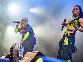 TLC's Tionne Watkins, left, and Rozonda Thomas perform June in Roskilde, Denmark. They headline Thursday's opening night of Empire Rockfest in Belleville.
