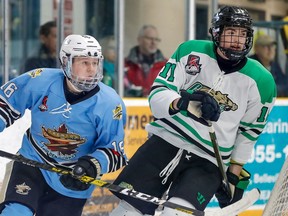 The Trenton Golden Hawks' Jared Gerger, left, skates alongside recent Trenton addition Mitch LaFay, then of the Cobourg Cougars, in a game Jan. 24, 2020 in Trenton.