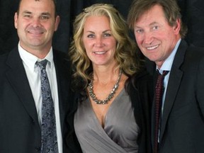 Darren and Michele DeDobbelaer pose with Wayne Gretzky. Submitted