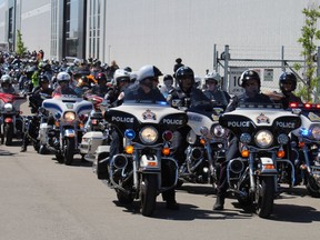 Brantford Police get ready to lead about 300 motorcycle riders in the 18th annual Lansdowne Charity Motorcycle Ride on Saturday, July 9. MICHELLE RUBY PHOTO