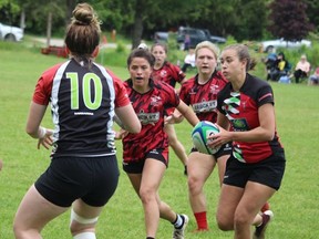 Maddi Cohoon carries the ball for the Brantford Harlequins in recent Rugby Ontario Women's League action. Submitted