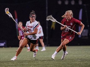 Brantford's Bianca Chevarie (left), shown in action against England, recently came home with silver from the 2022 World Lacrosse Women's World Championship in Towson, Maryland, after Canada was defeated 11-8 in the championship game. Photo courtesy Lacrosse Canada