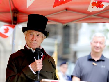 Brian Porter portrays Charles Jones, a prominent Brockville historical figure whose many roles included the equivalent of the city's mayor, while current Mayor Mike Kalivas looks on. (RONALD ZAJAC/The Recorder and Times)