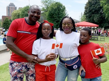 Isaac and Alo Akanbi and their twins Ruby, second from left, and Diamond pose on the Court House Green after Canada Day celebrations in Brockville. (RONALD ZAJAC/The Recorder and Times)