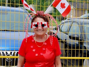 Brenda Fisk, decked out in Canada Day gear, celebrated her birthday on Canada Day and greeted those entering the 1000 Islands Rifest, which was hosted at the Lou Jeffries Gananoque and TLTI Recreation Centre.( KEITH DEMPSEY/Local Journalism Initiative)