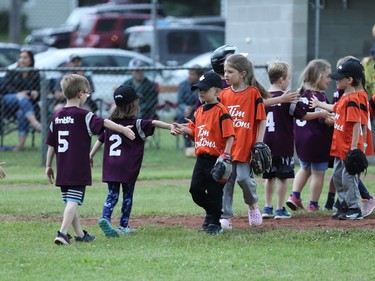 Coach-pitch players in Brockville Little League Baseball line up at the end of their 2022 spring season-ender at the Legion fields.
Tim Ruhnke/The Recorder and Times