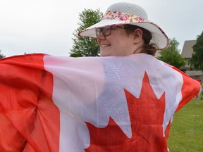 Mary Mak was showing off the Canadian Flag at Lamoureux Park on Friday July 1, 2022 in Cornwall, Ont. Shawna O'Neill/Cornwall Standard-Freeholder/Postmedia Network