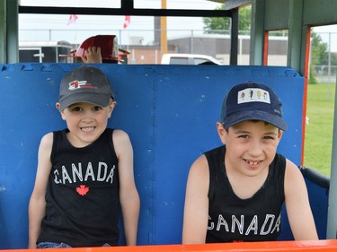 Reece and Bryson MacGillivray about to take a train ride around Arnold Bethune Park on Friday July 1, 2022 in Long Sault, Ont. Shawna O'Neill/Cornwall Standard-Freeholder/Postmedia Network