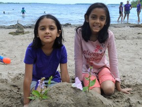 Sisters Anahata and Suria built a sand castle as a part of a friendly competition during South Stormont's Beach Day at Lakeview Heights Beach on Monday July 4, 2022 in Cornwall, Ont. Shawna O'Neill/Cornwall Standard-Freeholder/Postmedia Network