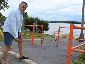 Nearby resident and chairperson of L'Association Renaissance Association Mark MacDonald, showing how the Chuck Charlebois Trail is not wheelchair accessible off of Prince Arthur Street on Thursday July 14, 2022 in Cornwall, Ont. Shawna O'Neill/Cornwall Standard-Freeholder/Postmedia Network