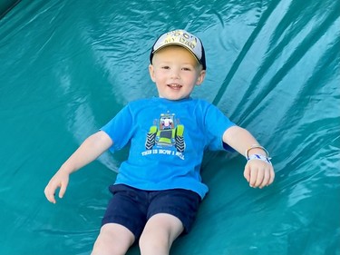 Wee! Cullan Begg was sliding down the big inflatable John Deere tractor at the 2022 Avonmore Fair on Saturday July 16, 2022 in Avonmore, Ont. Shawna O'Neill/Cornwall Standard-Freeholder/Postmedia Network