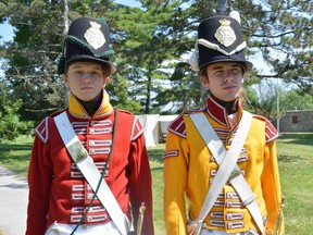 Graham Rowland (left) and Isaiah Guy, reenactors with the 100th Regiment of Foot, travelled from Ottawa to Upper Canada Village for the Battle of Crysler Farm reenactment. Pictured on Sunday July 17, 2022 in , Ont. Shawna O'Neill/Cornwall Standard-Freeholder/Postmedia Network