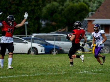 Wildcats' Evan Cordingly (left) throws up his hands as running back Mason Wilson (middle) scores a touchdown on Saturday July 23, 2022 in Cornwall, Ont. Robert Lefebvre/Special to the Cornwall Standard-Freeholder/Postmedia Network
