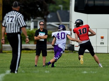 Wildcats quarterback/wide receiver, Ryan Stephens (right) trying to get around a Toronto Thunder player on Saturday July 23, 2022 in Cornwall, Ont. Robert Lefebvre/Special to the Cornwall Standard-Freeholder/Postmedia Network