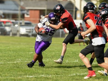 Wildcats coming in for the pounce, taking down a Toronto Thunder player on Saturday July 23, 2022 in Cornwall, Ont. Robert Lefebvre/Special to the Cornwall Standard-Freeholder/Postmedia Network