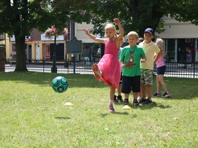 Aisley St. Jean kicking a soccer ball during the Amazing Race themed day at the Salesian summer camp on Tuesday July 26, 2022 in Cornwall, Ont. Laura Dalton/Cornwall Standard-Freeholder/Postmedia Network