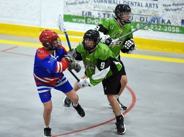 Cornwall Celtics Benjamin Houle (No. 9) getting checked by a Whitby Warriors player during Game 4 first-round playoff play on Sunday July 3, 2022 in Cornwall, Ont. Cornwall lost this game 7-6, and the best-of-five series is tied 2-2. Robert Lefebvre/Special to the Cornwall Standard-Freeholder/Postmedia Network
