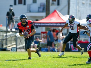 Cornwall Wildcats quarterback Xavier Uhr looks for a receiver during the team's game against the Myers Riders on Saturday July 9, 2022 in Cornwall, Ont. The Wildcats lost 42-36. Robert Lefebvre/Special to the Cornwall Standard-Freeholder/Postmedia Network