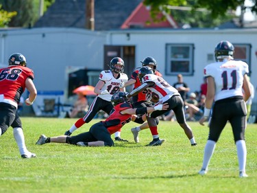 Cornwall Wildcats Tristan Hawksby brings down a Myers Riders player on Saturday July 9, 2022 in Cornwall, Ont. The Wildcats lost 42-36. Robert Lefebvre/Special to the Cornwall Standard-Freeholder/Postmedia Network