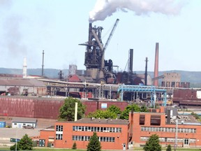 Algoma Steel as seen from the International Bridge on Saturday, June 29, 2019. The Algoma Steel Group 
the and United Steelworkers Local Union 2251 
union , epresenting Algoma’s hourly employees, announced on Saturday that the parties have agreed to a 15-day extension beyond the Jluly 31 expiry of the collective agreement for the purpose of continued discussions.