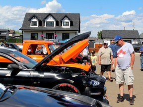 People attend the Local HERO Foundation car show at the Royal Canadian Legion in Fort McMurray on Saturday, July 16, 2022. Laura Beamish/Fort McMurray Today/Postmedia Network