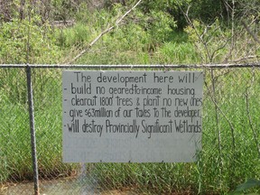 A sign along the K&P Trail expresses concern about the proposed development of the former Davis Tannery site in Kingston, Ont. on Monday, July 19, 2022. 
Elliot Ferguson/The Whig-Standard/Postmedia Network