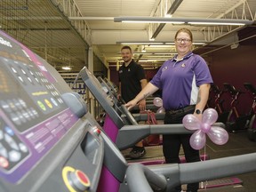 Patrick Leroux, left, Planet Fitness general manager in Kingston, and Kim Traill, Planet Fitness general manager in Napanee, check out some of the 28 new pieces of cardio equipment in the new mezzanine Mini Planet Fitness centre, opening this fall to members of BGC South East. The launch on Monday included a tour of the BGC South East Kingston facility.