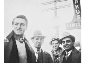 Can you identify any of these men photographed in downtown Kirkland Lake, likely in the 1940s?