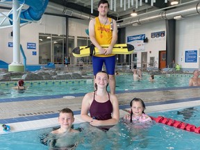 Lifesaving Society Canada and the Kirkland Lake Parks and Recreation Department are bringing awareness to the drowning problem during National Drowning Prevention Week from July 17th – 23rd, 2022. In the photo, Left to right: Maki Nychuk, Aquatic Staff Kaitlyn Maille, Vanessa Charbonneau. Behind: Lifeguard Kalan Breen  Supplied photo