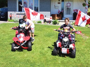 Photo by KEVIN McSHEFFREY
Two brothers Kayden, age 6, and Colten Colquhoun, age 9, took first place in Elliot Lake’s decorating contest in the bikes/vehicles category.