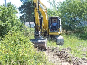 Photo by LESLEY KNIBBS
Work began on readying the site of the Mennonite school on July 23 in Sables Spanish River Township.