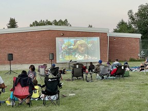 The Town of Pincher Creek hosted a free movie in the park on a projector and screen.