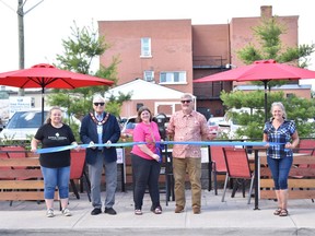 Taking part in the official opening of the PBIA's patio pilot project was, from left, Stacy Taylor (PBIA Board vice-chairwoman), Pembroke Mayor Mike Lemay, Bethea Summers (PBIA executive director), Brian Abdallah (PBIA board council representative) and Janna Fortin (PBIA board chairwoman).