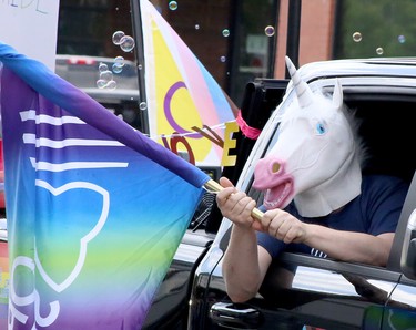 Participants in the Fierte Sudbury Pride March make their way through downtown Sudbury, Ontario on Saturday, July 16, 2022. Ben Leeson/The Sudbury Star/Postmedia Network