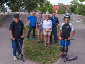 The next phase of Stratford's all-wheels park will include four new rain gardens, a first on public land in Stratford.  Pictured from left is Damien Burt, Stratford parks manager Quin Malott, volunteer Bruce Whitaker, Stratford District secondary school teacher Christine Ritsma, Upper Thames River Conservation Authority community education supervisor Vanni Azzano, and Lake Hodson.  (Chris Montanini/Stratford Beacon Herald)