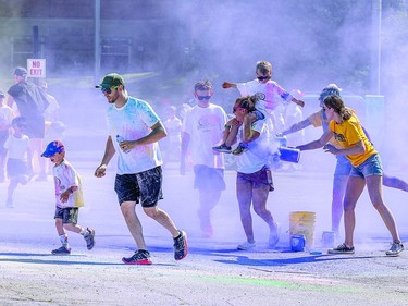 MIRACLE MILE RotaryFest Miracle Mile Colour Blast run along Queen Street took place Saturday morning before the community day parade. Runners were doused with coloured cornstarch as they made their way along the route that started at the Canadian Bushplane Heritage Centre and ended at GFL Memorial Gardens. Runners received sunglasses and a colour blast t-shirt for participating in the event. The event raises funds for Rotary and provides other organizations an apportunity to raise funds too. BOB DAVIES