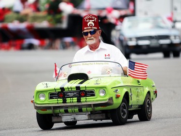 The Lambton Shrine Club Motor Corps drives their little cars through Sarnia's Canada Day parade on Friday. Terry Bridge/Sarnia Observer/Postmedia Network