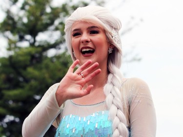A woman dressed as the Disney character Elsa waves at the crowd during Sarnia's Canada Day parade on Friday. Terry Bridge/Sarnia Observer/Postmedia Network